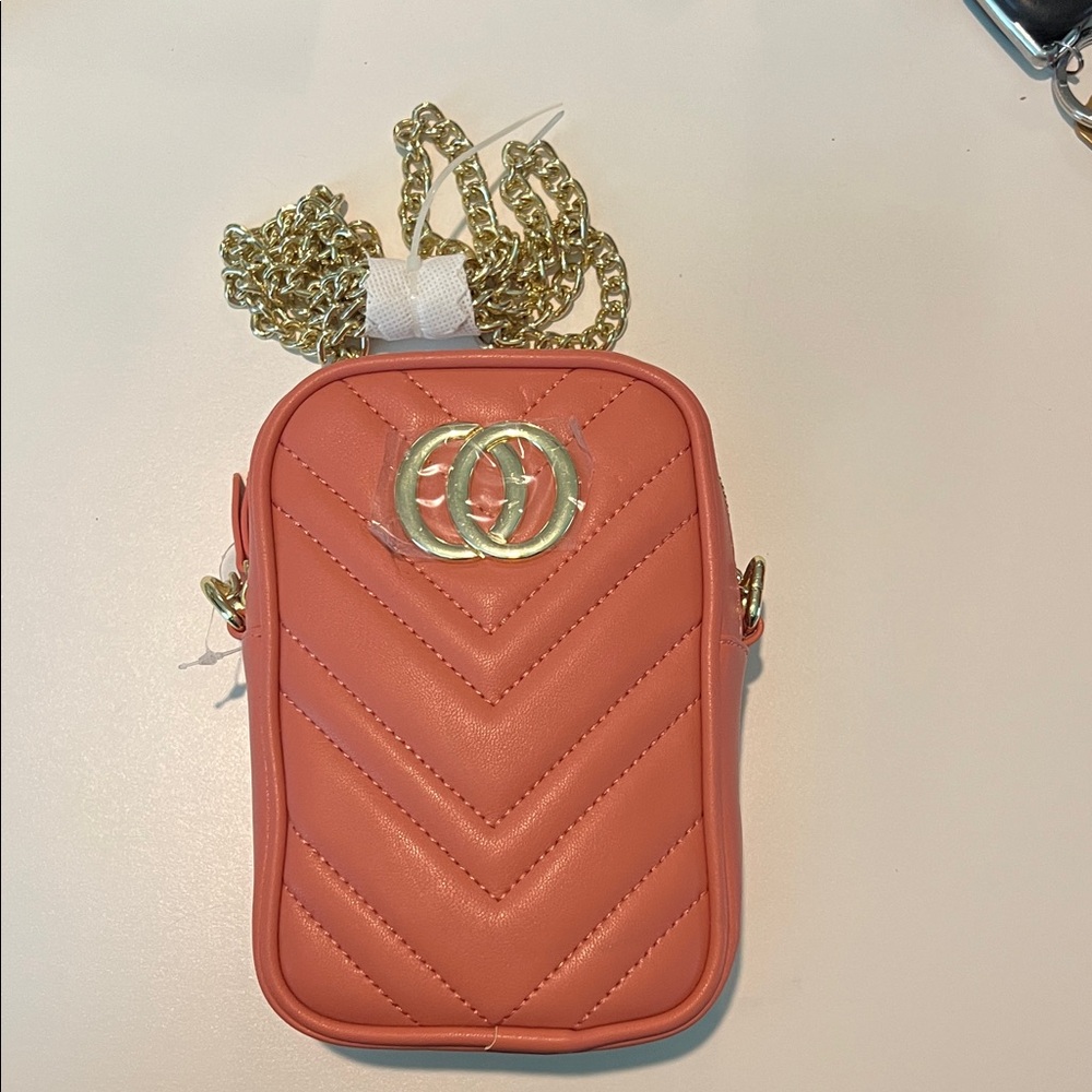 Elegant Pink and Gold Crossbody Bag with Chevron Pattern